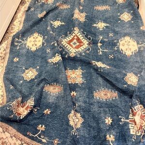 Blue and Cream Patterned area rug